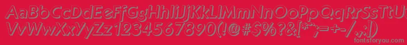 KoblenzshadowMediumItalic-fontti – harmaat kirjasimet punaisella taustalla