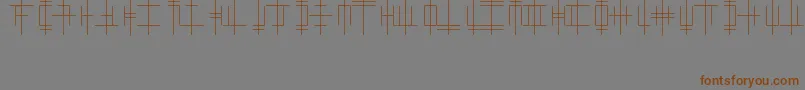 OriginAlphabet Font – Brown Fonts on Gray Background