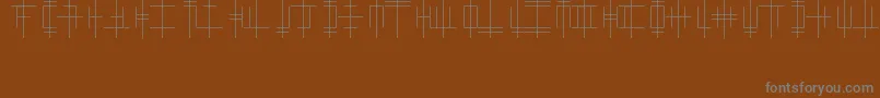 Шрифт OriginAlphabet – серые шрифты на коричневом фоне