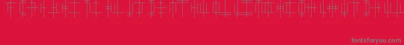 OriginAlphabet-Schriftart – Graue Schriften auf rotem Hintergrund