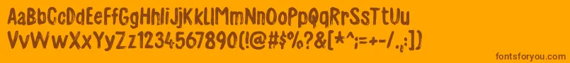 Шрифт Charmeladedemo – коричневые шрифты на оранжевом фоне