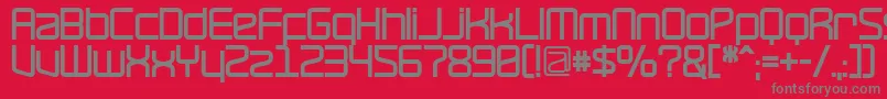 RavepartyBold-fontti – harmaat kirjasimet punaisella taustalla