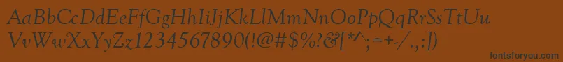 GoudyoldstytItalic-Schriftart – Schwarze Schriften auf braunem Hintergrund