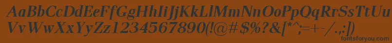 PaxBolditalic Font – Black Fonts on Brown Background