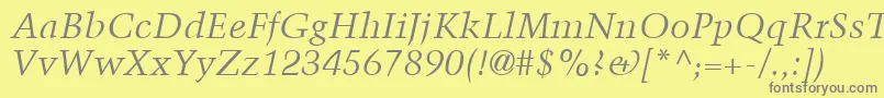 フォントTrumpMediaevalLtItalic – 黄色の背景に灰色の文字