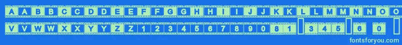 Acfilmstrip Font – Green Fonts on Blue Background