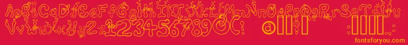 フォントMontezumasRevenge – 赤い背景にオレンジの文字