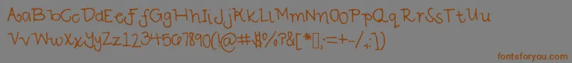 フォントSavannah – 茶色の文字が灰色の背景にあります。