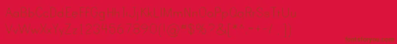 PrintClearlyTt-Schriftart – Braune Schriften auf rotem Hintergrund