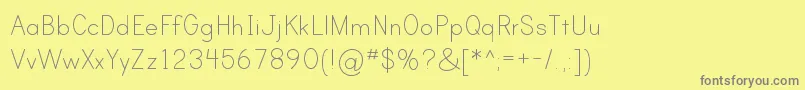 PrintClearlyTt-fontti – harmaat kirjasimet keltaisella taustalla