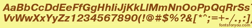 フォントPrg76Ac – 茶色の文字が黄色の背景にあります。