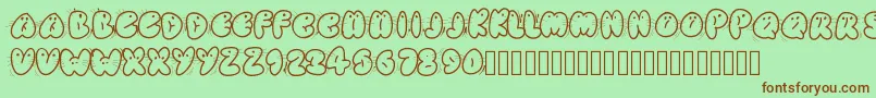 Animaletters Font – Brown Fonts on Green Background