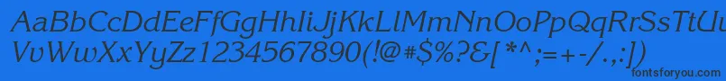 Czcionka KorinnaattItalic – czarne czcionki na niebieskim tle