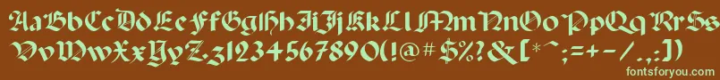 フォントPaladpcr – 緑色の文字が茶色の背景にあります。