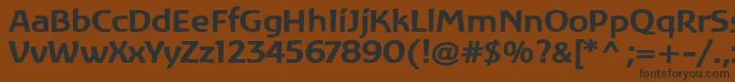 フォントLinotypeAtlantisBold – 黒い文字が茶色の背景にあります