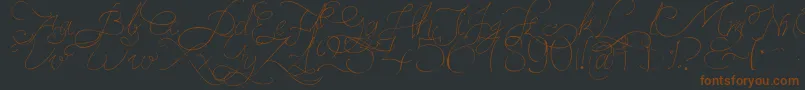 Czcionka PersifalPen – brązowe czcionki na czarnym tle