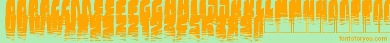 KolossalBlack Font – Orange Fonts on Green Background