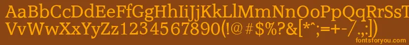 フォントAccoladeserialRegular – オレンジ色の文字が茶色の背景にあります。