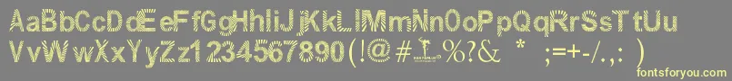 PawlukZibra Font – Yellow Fonts on Gray Background