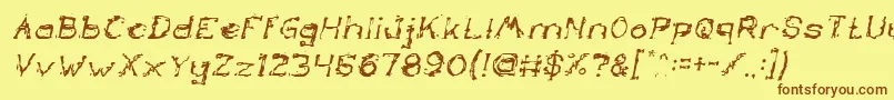 Czcionka TheLazyDogItalic – brązowe czcionki na żółtym tle