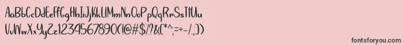 Fonte SummersVictoryOverSpringOtf – fontes pretas em um fundo rosa