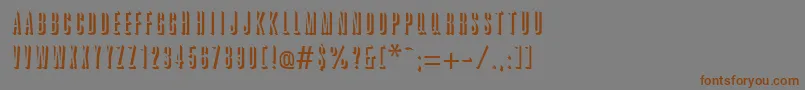 フォントGreatreliefRegular – 茶色の文字が灰色の背景にあります。