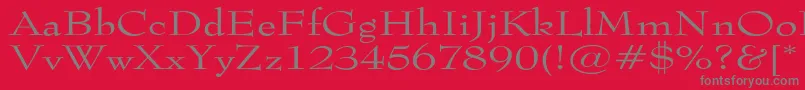 フォントTophatextended – 赤い背景に灰色の文字
