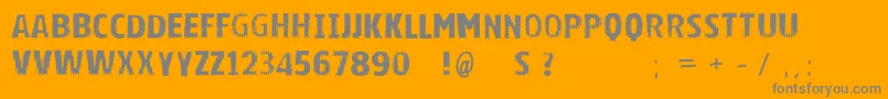 Czcionka Vtksbright – szare czcionki na pomarańczowym tle
