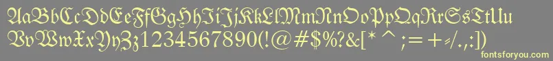 FrakturBt Font – Yellow Fonts on Gray Background