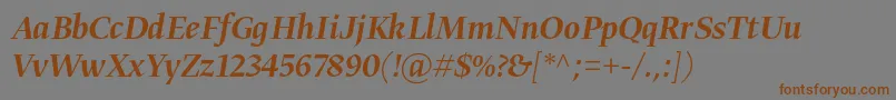 GretadisplayproMediumitalic-fontti – ruskeat fontit harmaalla taustalla