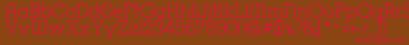K22KarnakDeco Font – Red Fonts on Brown Background