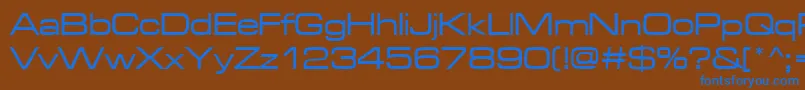 Microgrammadmedext Font – Blue Fonts on Brown Background