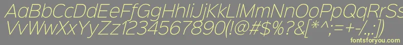 Sinkinsans200xlightitalic-fontti – keltaiset fontit harmaalla taustalla