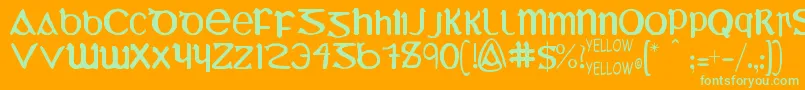 UncialMostIrish-Schriftart – Grüne Schriften auf orangefarbenem Hintergrund