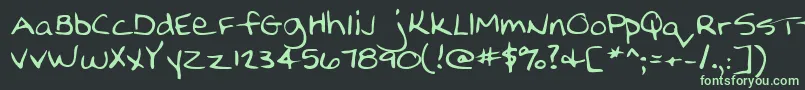 Nellyshand Font – Green Fonts on Black Background