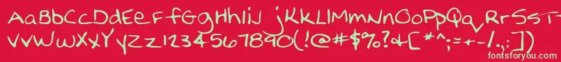 Nellyshand Font – Green Fonts on Red Background