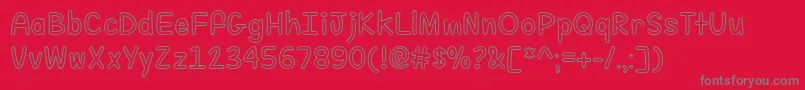 FillMeWithColorTtf-fontti – harmaat kirjasimet punaisella taustalla