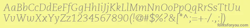 フォントPmnCaeciliaLt46LightItalic – 黄色の背景に灰色の文字