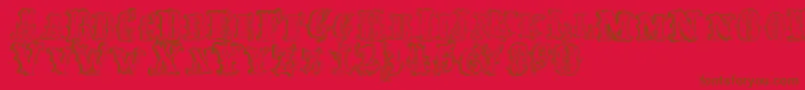 FredwildwestRegular Font – Brown Fonts on Red Background