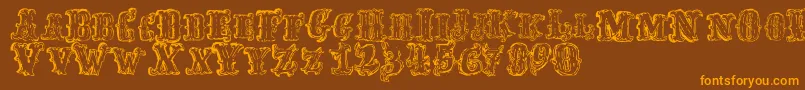 FredwildwestRegular Font – Orange Fonts on Brown Background