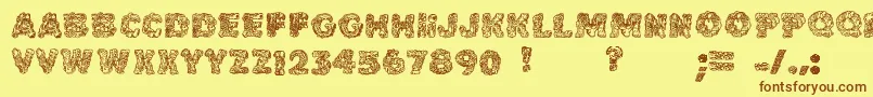 Cake Frosting Decorative-Schriftart – Braune Schriften auf gelbem Hintergrund