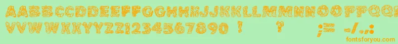 Cake Frosting Decorative-Schriftart – Orangefarbene Schriften auf grünem Hintergrund