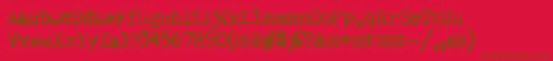 Quiettyper Font – Brown Fonts on Red Background