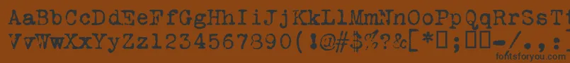 フォントVtremingtonportable – 黒い文字が茶色の背景にあります