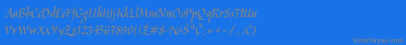 フォントKaligraflatin – 青い背景に灰色の文字