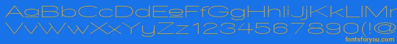 WalkwayUpperUltraexpand Font – Orange Fonts on Blue Background
