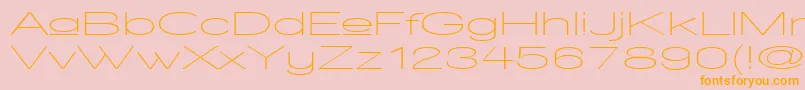 フォントWalkwayUpperUltraexpand – オレンジの文字がピンクの背景にあります。