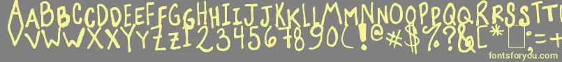 Suzanna Font – Yellow Fonts on Gray Background