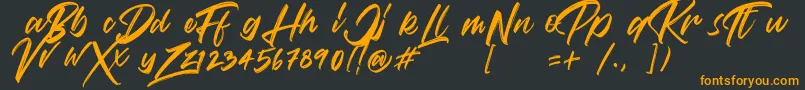 VaughanHandstylishfontDemo-fontti – oranssit fontit mustalla taustalla