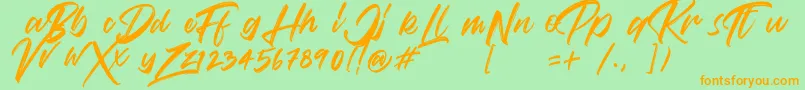 Fonte VaughanHandstylishfontDemo – fontes laranjas em um fundo verde